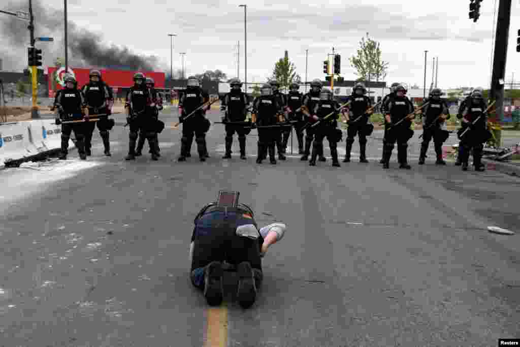 A man preaches through tears as State Police block access to the area near the Minneapolis Police third precinct following days of demonstrations in response to the death of African-American man George Floyd in Minneapolis, Minnesota.