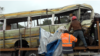 The mangled Lucky Vincent school bus is being hauled away after plunging into a ravine on May 6, 2017. The accident killed 35 people, mostly schoolchildren. (Courtesy - Willy Lowry)