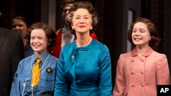 From left, Sadie Sink, Helen Mirren and Elizabeth Teeter appear on stage at the Broadway opening night curtain call of "The Audience" at The Gerald Schoenfeld Theatre, March 8, 2015, in New York.