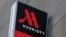 FILE - Signage for the New York Marriott Marquis is seen in Manhattan, New York, Nov. 16, 2015. 