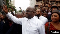 Felix Tshisekedi, leader of the Congolese main opposition party, the Union for Democracy and Social Progress who was announced as the winner of the presidential elections, gestures to his supporters in Kinshasa, Democratic Republic of Congo, Jan. 10, 2019.