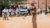 FILE - A soldier from Spain guards the European Union Training Mission (EUTM) camp in Koulikoro, Mali, November 28, 2017. 