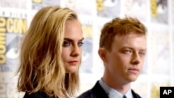 Cara Delevingne and Dane DeHaan attend the "Valerian and the City of a Thousand Planets" press line on Day 1 of Comic-Con International in San Diego, July 21, 2016.