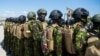 Kenyan police officers arrive at Toussaint Louverture International Airport in Port-au-Prince, Haiti, on Feb. 6, 2025.