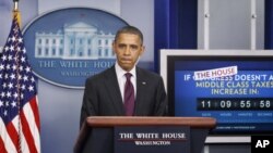 President Barack Obama speaks during the news briefing at the White House, Tuesday, Dec. 20, 2011, in Washington.