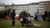 Reporters stand in front of the Agostino Gemelli Polyclinic, in Rome, Feb. 18, 2025, where Pope Francis has been hospitalized to undergo some necessary diagnostic tests and to continue his ongoing treatment for bronchitis.