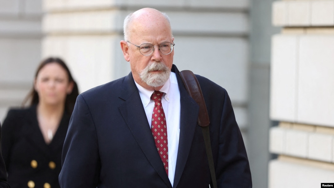 FILE - Special Counsel John Durham departs the U.S. Federal Courthouse in Washington, May 17, 2022. 