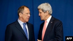 FILE - Russia's Foreign Minister Sergei Lavrov (L) and US Secretary of State John Kerry meet to discuss the Ukraine crisis .