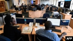 FILE - Reporters work from their desks in a newsroom of Kenya's Nation Media Group in Nairobi, January 19, 2018. The Chinese Embassy in Kenya has begun conducting media training in the country.