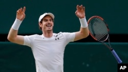 Andy Murray of Britain celebrates after beating Milos Raonic of Canada in the Wimbledon finals Sunday, July 10, 2016