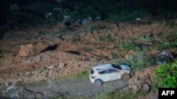 Foto divulgada pela assessoria de imprensa do Governo de Choco mostrando a área de um deslizamento de terra na estrada entre Quibdo e Medellín, 12 de janeiro de 2024