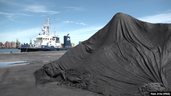 FILE - North Korean coal is shown after being unloaded at the Port of Pohang, South Korea.