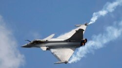FILE - A Rafale single-seat jet aircraft flies during its demonstration at the Paris Air Show, in Le Bourget airport, north of Paris, June 19, 2015.
