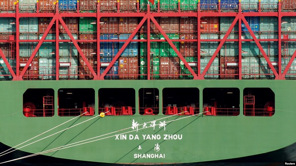 FILE - China Shipping containers sit on a ship in the Port of Los Angeles after being imported to the U.S., California, Oct. 7, 2010. 