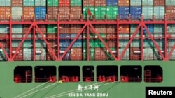 FILE - China Shipping containers sit on a ship in the Port of Los Angeles after being imported to the U.S., California. 