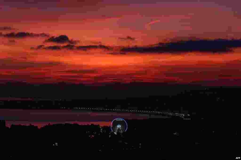 The &quot;Baie des Anges&quot; on the French Riviera in Nice is seen at sunset. 