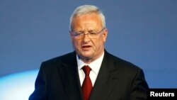 FILE - Volkswagen CEO Martin Winterkorn gives his closing speech during the Volkswagen group night ahead of the Frankfurt Motor Show (IAA) in Frankfurt, Germany, Sept. 14, 2015. 