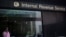 A woman walks out of the Internal Revenue Service building in New York, May 13, 2013.