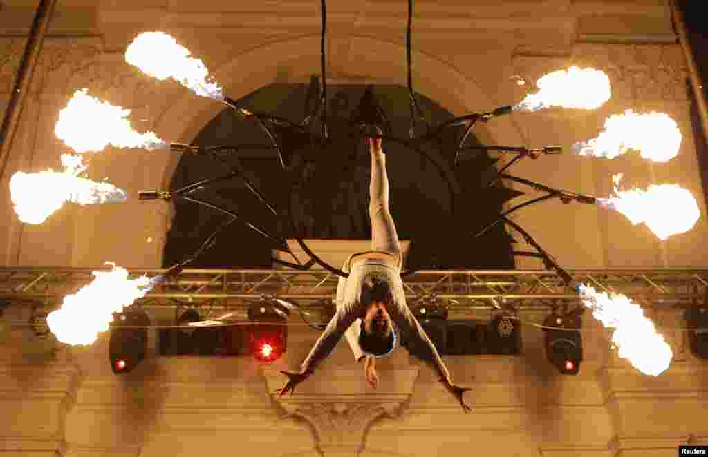 A member of Singapore&#39;s Starlight Alchemy performs during a media preview of the Singapore Night Festival.