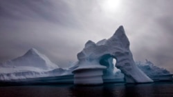 In this July 19, 2007 file photo an iceberg is seen off Ammassalik Island in Eastern Greenland. The Arctic is a thermostat against overheating and a barometer of change, but now its own protective ozone layer that keeps out damaging ultraviolet radiation has thinned to record levels, the U.N. weather agency said Tuesday April 5, 2011. (John McConnico, Associated Press)