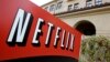 FILE - A sign points to Netfilx headquarters in Los Gatos, Calif. Netflix.