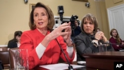 FILE - House Minority Leader Nancy Pelosi, D-Calif., left, appears before the House Rules Committee on Capitol Hill, in Washington, Dec. 21, 2017.
