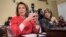 FILE - House Minority Leader Nancy Pelosi, D-Calif., left, appears before the House Rules Committee on Capitol Hill, in Washington, Dec. 21, 2017.