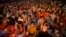 FILE - Protesters attend a candlelight night rally in Yangon, Myanmar, March 13, 2021. Until mid-2021, there were many strike groups conducting flash mob protests but now only 10 have survived, strike groups said. 
