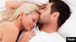 A new study suggests a healthy sex life can pay dividends at work. (Flickr)