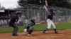 Timberline High School players in Lacey, Washington, used the axe bat in warmups, but stayed with the traditional bats for the actual game. (T. Banse/VOA).