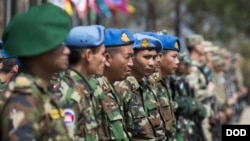 Cambodian soldiers stand in formation during the opening ceremony of Shanti Prayas III.
