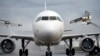 FILE - A photo taken on December 8, 2014 shows an Airbus A320 aircraft at the Roissy-Charles-De-Gaulle airport. 