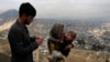 FILE - A child receives polio vaccination drops during an anti-polio campaign in Kabul, Afghanistan.