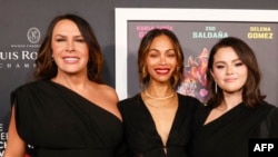 FILE - (L to R) Actresses Karla Sofia Gascon, Zoe Saldana and Selena Gomez attend a screening of "Emilia Perez" in Los Angeles on Oct. 29, 2024. The movie had the most nominations — 13 — for this year's Academy Awards, it was announced on Jan. 23, 2025.