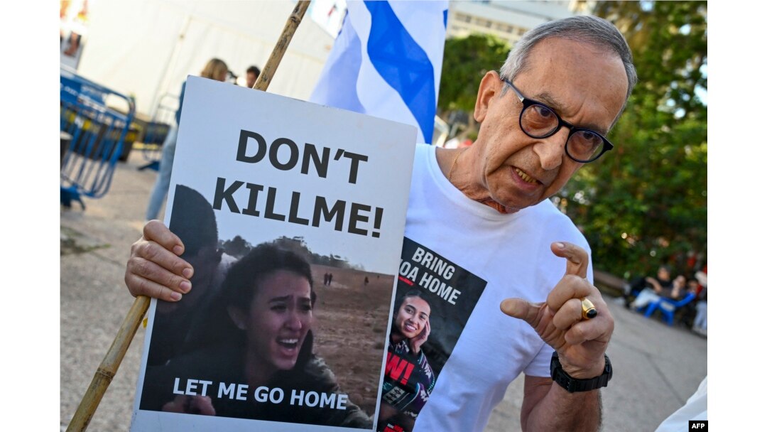 FILE - Yakov Argamani, father of 26-year-old Israeli hostage Noa Argamani, speaks to media outside the Tel Aviv Museum of Art, now informally called the "Hostages Square", in Tel Aviv, Dec. 16, 2023.