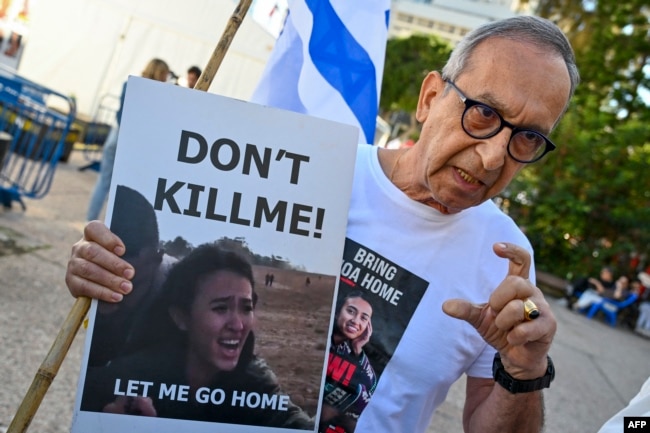 FILE - Yakov Argamani, father of 26-year-old Israeli hostage Noa Argamani, speaks to media outside the Tel Aviv Museum of Art, now informally called the 