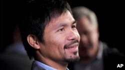 FILE - Manny Pacquiao at a press conference in New York City.