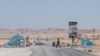 FILE - A checkpoint in the desert of the Somali region of Puntland leads to the port city of Bossaso, March 25, 2018. Authorities in Puntland announced this week measures to disrupt Islamic State financial networks in Somalia.