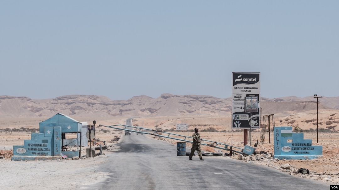 FILE - A checkpoint in the desert of the Somali region of Puntland leads to the port city of Bossaso, March 25, 2018. Authorities in Puntland announced this week measures to disrupt Islamic State financial networks in Somalia.