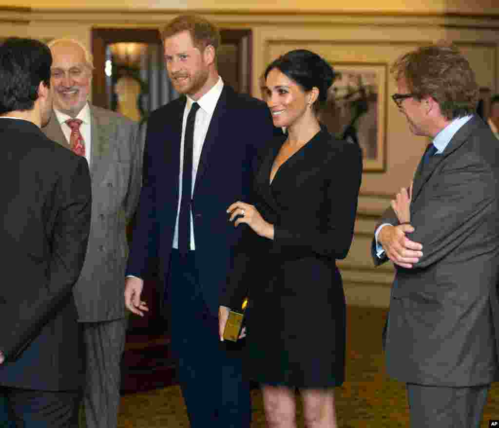 Britain&#39;s Prince Harry and Meghan, Duchess of Sussex, attend a gala performance of the musical Hamilton at the Victoria Palace Theatre, in support of the charity Sentebale, in London, Aug. 29 2018.