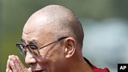 The Dalai Lama arrives at the World Peace Event on the west lawn of the US Capitol in Washington, July 9, 2011