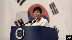 FILE - South Korean President Park Geun-hye delivers a speech during a ceremony to celebrate Korean Liberation Day from Japanese colonial rule in 1945, at Seong Cultural Center in Seoul, South Korea, Aug. 15, 2015.