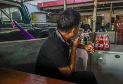 Lau Zhu says business is slow after hundreds of Chinese nationals left Sihanoukville after the city closed its casinos following the COVID-19 outbreak, Sihanoukville, Cambodia, May 19, 2020. (Khan Sokummono/VOA Khmer)