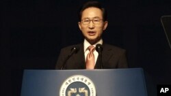 FILE - South Korean President Lee Myung-bak delivers a speech during a ceremony to celebrate Korean Liberation Day from Japanese colonial rule, Aug. 15, 2012.