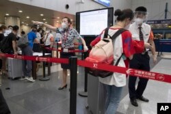 တရုတ္ႏိုင္ငံ Beijing ၿမိဳ႕ရွိ အျပည္ျပည္ဆိုင္ရာေလဆိပ္မွာ ေတြ႔ရတဲ့ ျမင္ကြင္း။ (ဇူလိုင္ ၁၇၊ ၂၀၂၀)