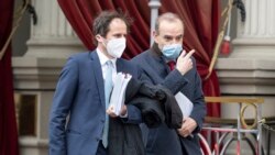 Deputy Secretary General and Political Director of the European External Action Service (EEAS), Enrique Mora, right, leaves the Grand Hotel Wien where closed-door nuclear talks with Iran take place in Vienna, Austria, Tuesday, April 6, 2021. (AP Photo)