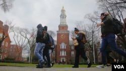 FILE - Brooklyn College students walk between classes on campus in New York, Feb. 1, 2017.