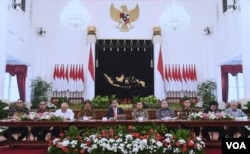 Presiden Jokowi beserta menteri dan pejabat terkait dalam konferensi pers "Pemindahan Ibu Kota Negara ke Kalimantan Timur" di Istana Negara, Jakarta, Senin, 26 Agustus 2019.(Foto: Biro Setpres).