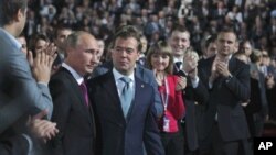 Putin i Medvjedev na Kongresu Ujedinjene Rusije u subotu 24. rujna 2011.