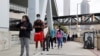 Redovi ispred košarkaške arene u Atlanti u kojoj je biračima omogućeno da ranije glasaju na izborima (Foto: Reuters/Chris Aluka Berry)